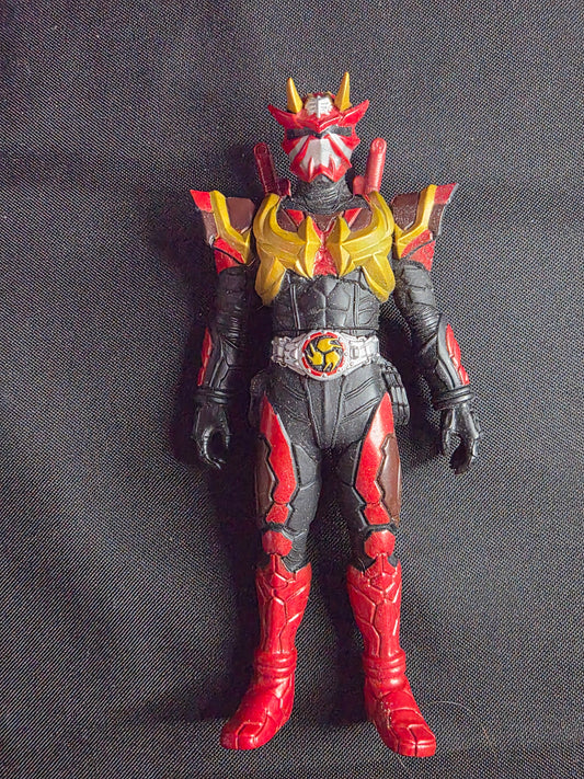 Action figure in red, black, and yellow costume on a dark background. 2005 Bandai Kamen Rider Armed Hibiki Figure – Japan Tokusatsu Sofubi
