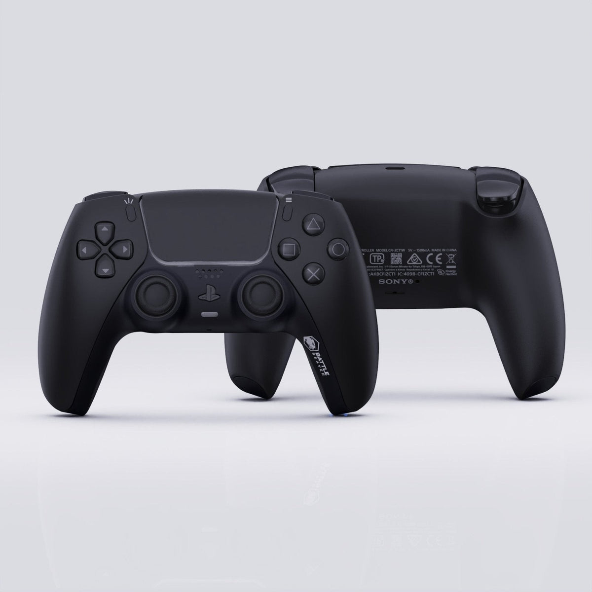 Black gaming controller on a light gray background
