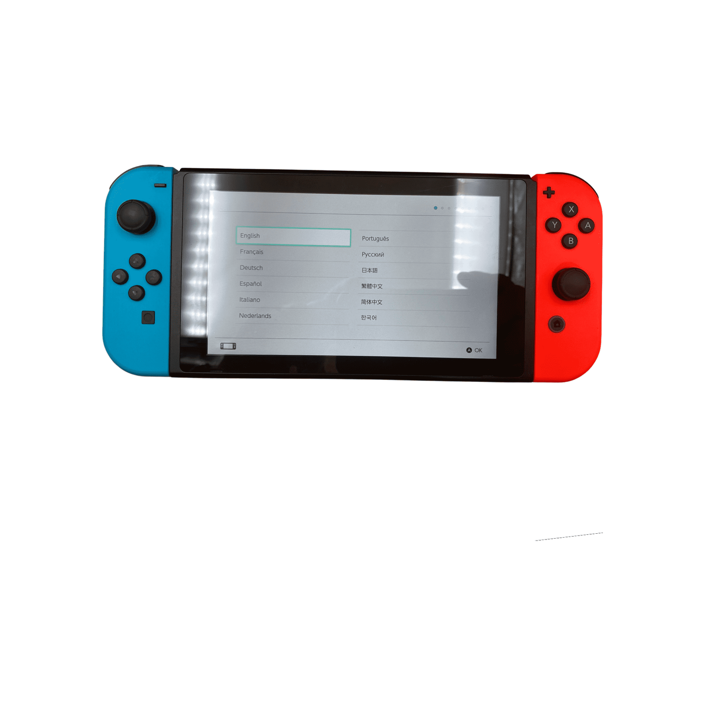 Blue and red gaming console controller on a white background