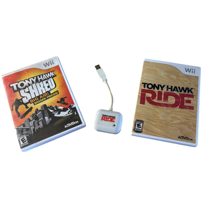 Two 'Tony Hawk' games for Wii console with a controller on a white background