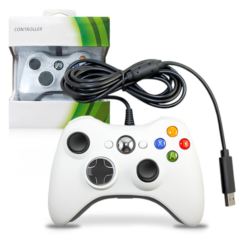 White gaming controller with USB cable in front of its packaging on a white background. Wireless Wired Game Handle Double Vibration