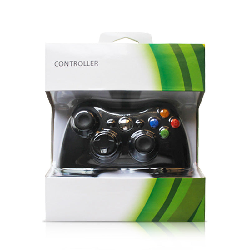 A black wired game controller inside its original retail packaging, which features a white box with green diagonal stripes and the word 'CONTROLLER' printed on the top. Wireless Wired Game Handle Double Vibration