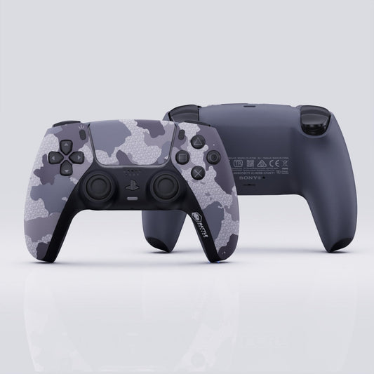 Camouflage-patterned gaming controller on a light gray background