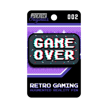 A packaged retro gaming 'GAME OVER' augmented reality pin by Pinfinity Originals. The product is shown in its retail blister card packaging, which features a purple and black design with pixelated graphics and the text 'RETRO GAMING AUGMENTED REALITY PIN'.
