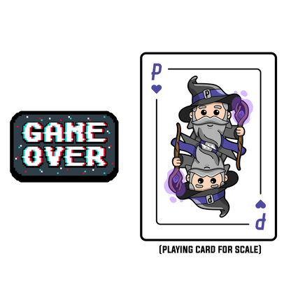 Cartoon wizard character on a playing card with 'Game Over' text and scale indicator.
