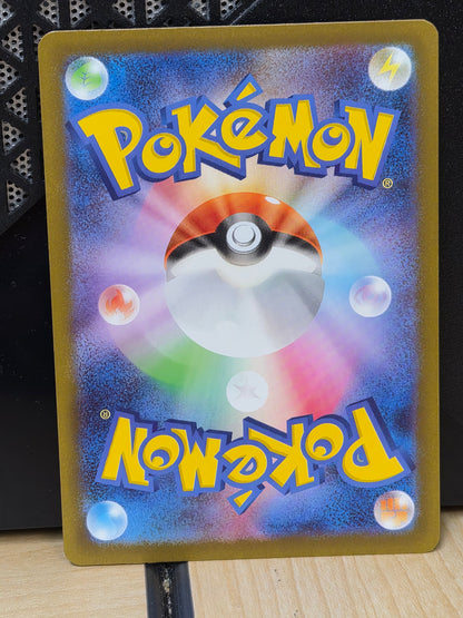 A custom hand-painted Pokémon card featuring a vibrant blue and purple cosmic background with a central Poké Ball, yellow 'Pokémon' logos at the top and bottom, and small colorful bubble accents, displayed on a stand. Pokemon Japan Mega Dream EX 201/193 Heliolisk Full Art NM TCG Card