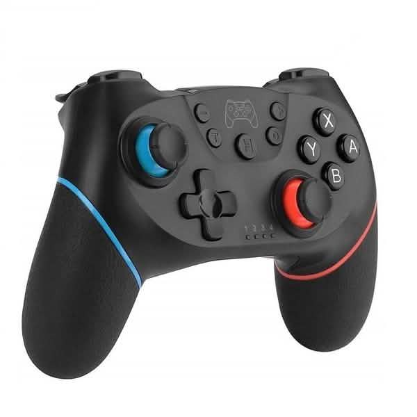 A black wireless gaming controller with textured grips, featuring a blue accent ring around the left analog stick, a red accent ring around the right analog stick, and white lettered buttons on the faceplate. Wireless Controller Switch Gamepad